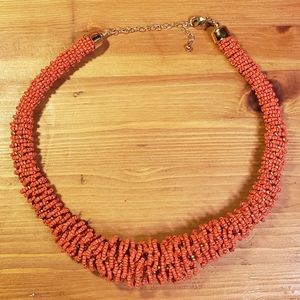 Red chunky beaded necklace. Length 16"